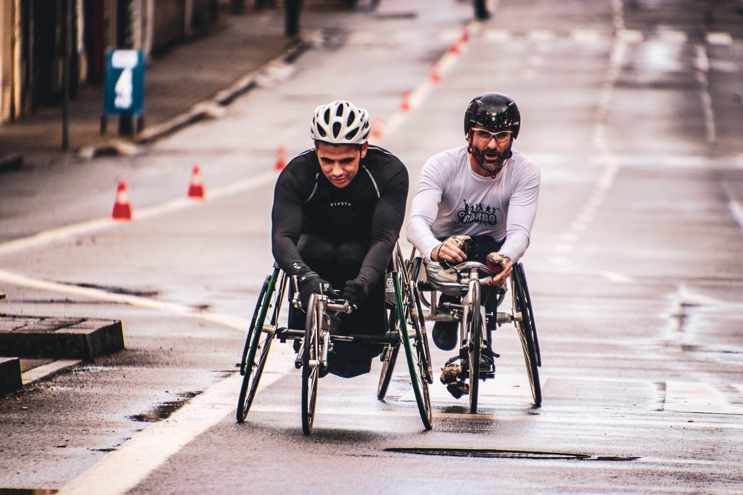 Image of two cycling athletes adapted in competition